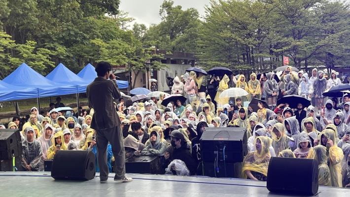 Despite the rain, the crowd’s enthusiasm was unshakable— umbrellas up, energy high, and vibes unstoppable!