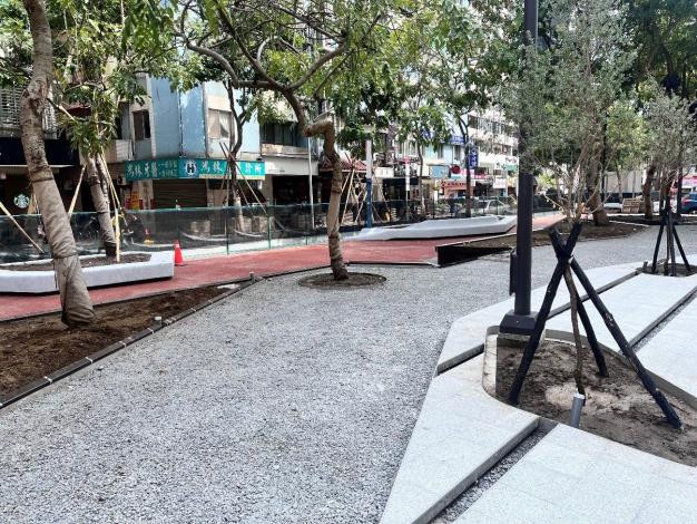 In-progress construction of permeable concrete pavement for a central green oasis