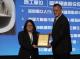 Image 1. Chairman Wang Tai-Dien presents the award; Senior Executive Officer Kuo Yu-Hsien from the New Construction Office receives it