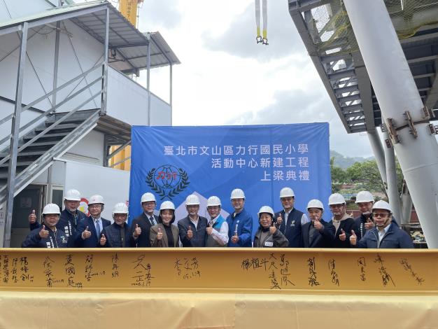 Figure 2 Signing and taking group photo