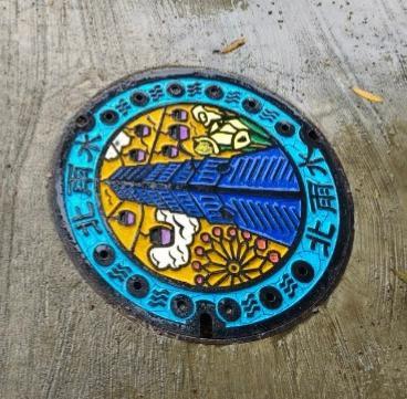 Character manhole covers “Taipei to the World” after cleanin