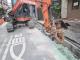 Demolition of the original gutter in progress