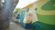 By using the angles of the retaining wall, the mural outlines the facial features of various characters, adding delightful surprises and visual depth