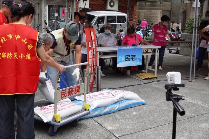 Stacking of sand bags at Zhulun Village