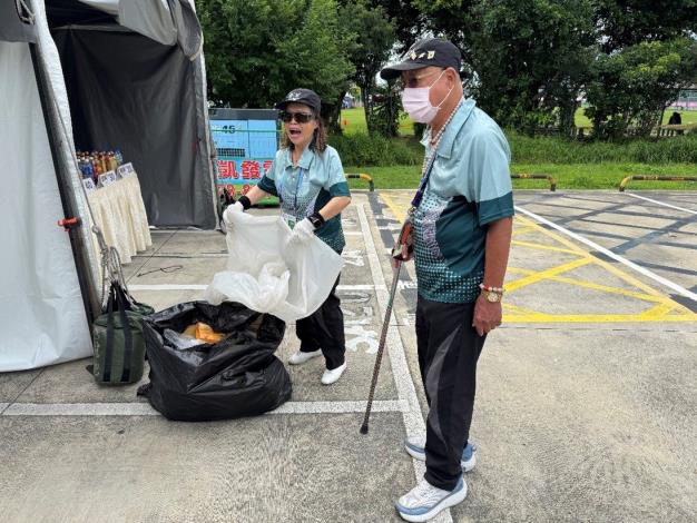 Mr. Hung assists in cleaning and maintaining the environment around the rugby field