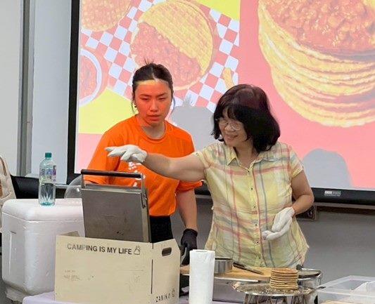 Cultural experience - students try their hands at making Dutch stroopwafels