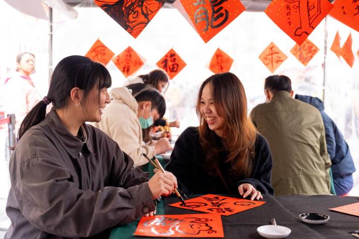 Citizens participate in the Dragon's Here Lunar New Year DIY arts