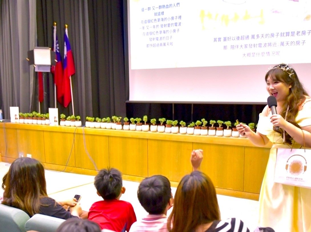 DJ Lydia Chen, host of SDGs Action Taker!, engages with children and adults at a TBS fan meet-up.