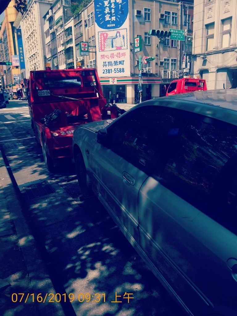 Handling of Vehicles Obstructing Traffic and Hogging Parking Spaces in Taipei City