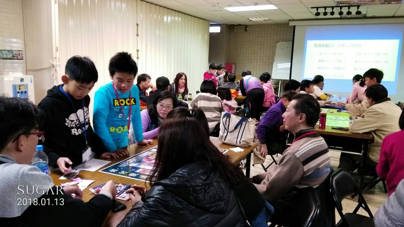 Participants taking part in the tablegame event organized by TAM