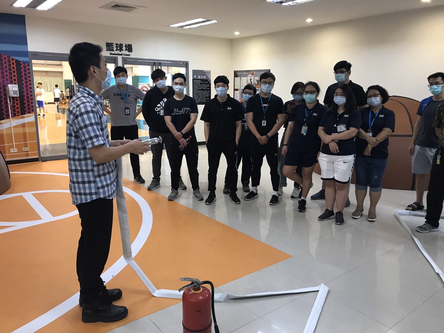 Staff attending fire safety seminar