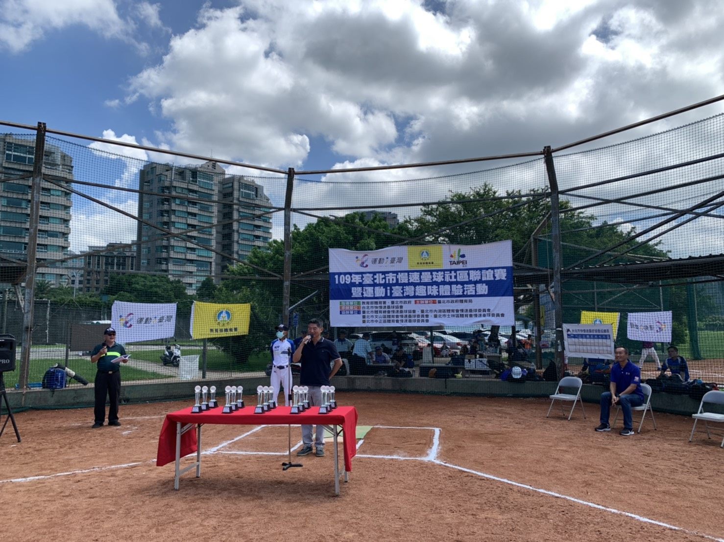 The opening ceremony of the community softball tournament.