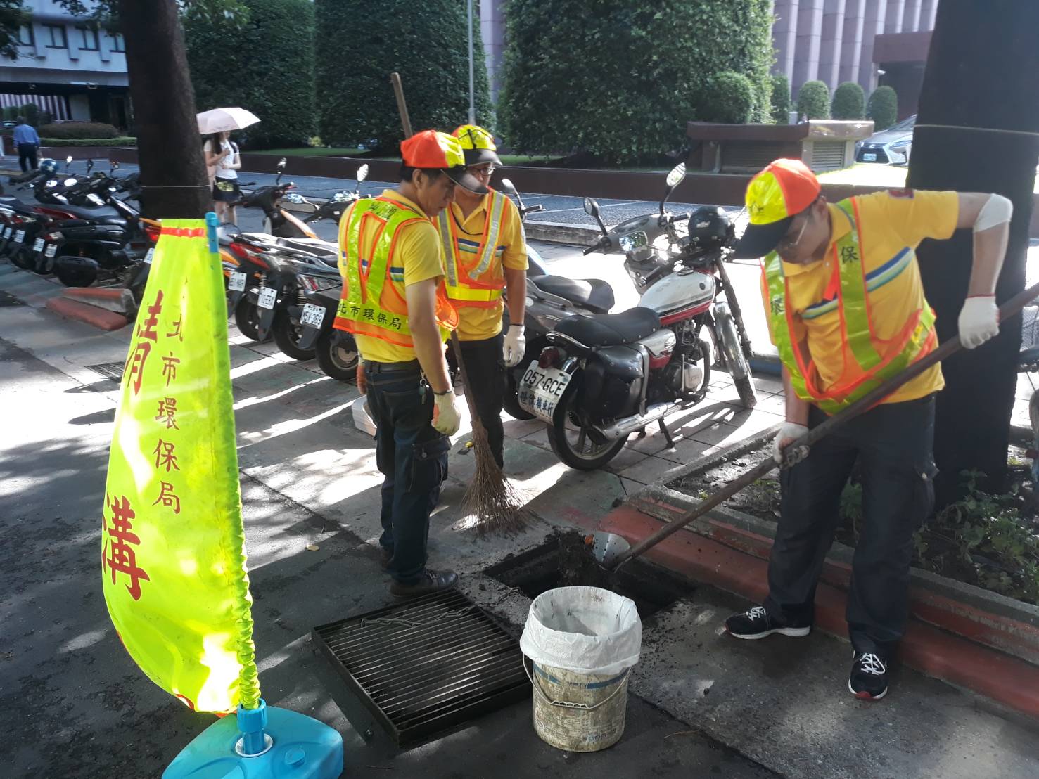 DEP staff cleaning out debris from roadside ditches