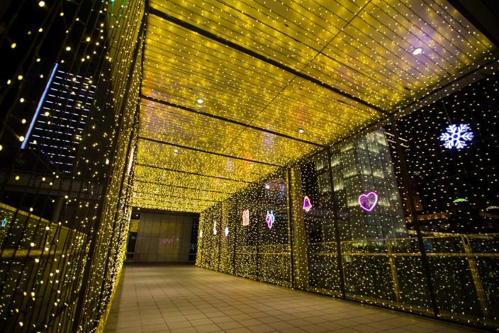 Christmas lights decorate the pedestrian skybridge in Xinyi district
