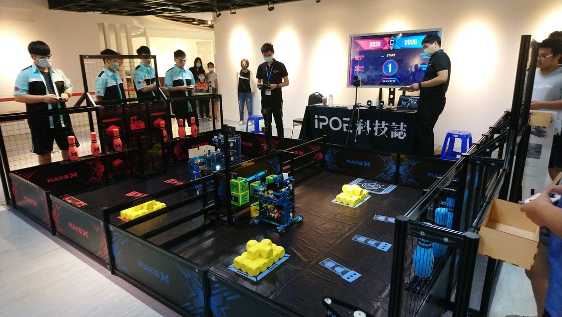 Individuals competing in the MakeX Robotics Competition