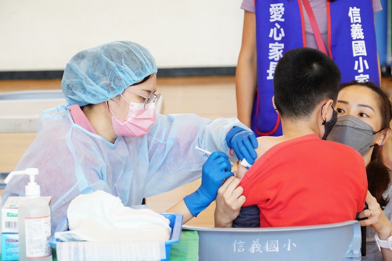 A shot being administered to a child