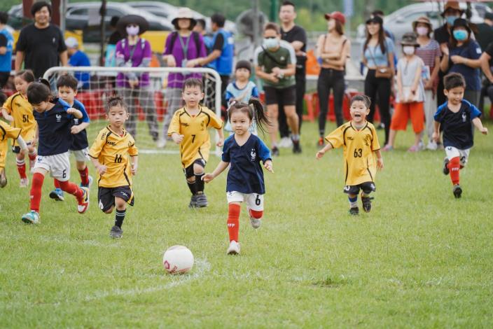 Preschool kids competing in the city-sponsored soccer tournament