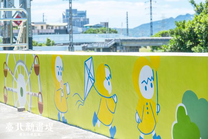 孩子快樂的在摩天輪玩耍