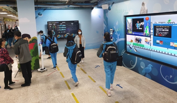 Students lining up to use the system (Image courtesy: Asia Pacific Telecom)