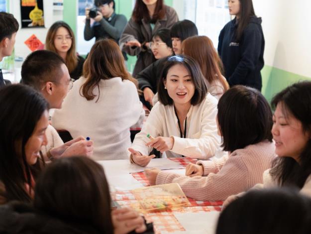 A gathering of the Overseas Volunteer Program participants, bringing together volunteers from different teams to share their experiences and prepare for their upcoming service.