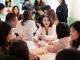 A gathering of the Overseas Volunteer Program participants, bringing together volunteers from different teams to share their experiences and prepare for their upcoming service.
