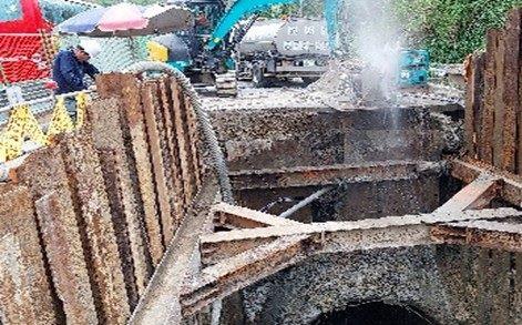 Chain saw cutting of existing culvert