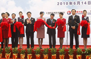 Hau takes first CAL direct flight to Shanghai