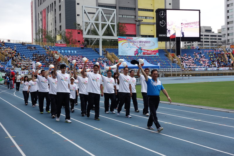The Commissioner leading our Department athletes into the grounds to participate in the opening ceremony.