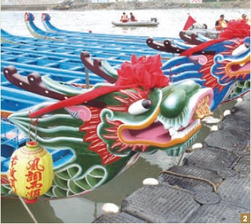 2. Two Dragon Boat Festival traditions are racing dragon boats and wearing xiangbao.