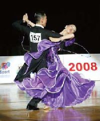 Dancers from around the world dance and glide elegantly on the floor.