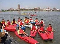 Gales of laughter amid water sports activities.