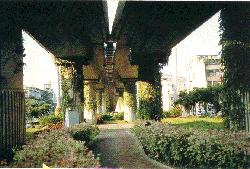parks under elevated stations and tracks on the tamsui line