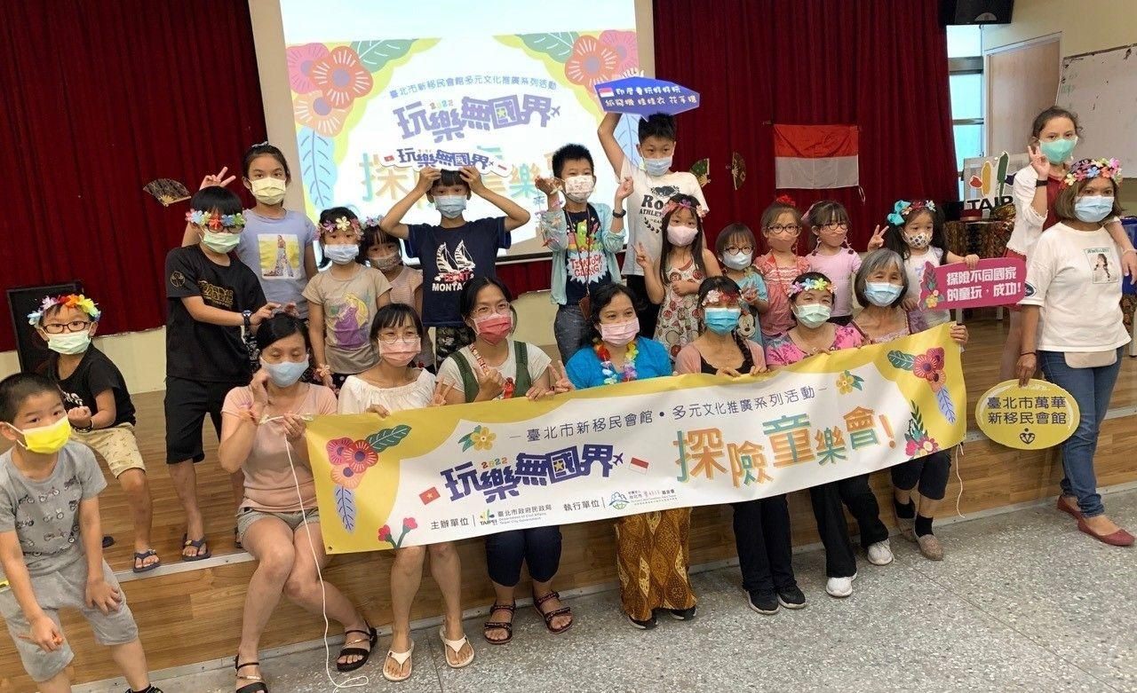 Indonesia 5 - Taking a group photo wearing the Indonesian flower art.jpg