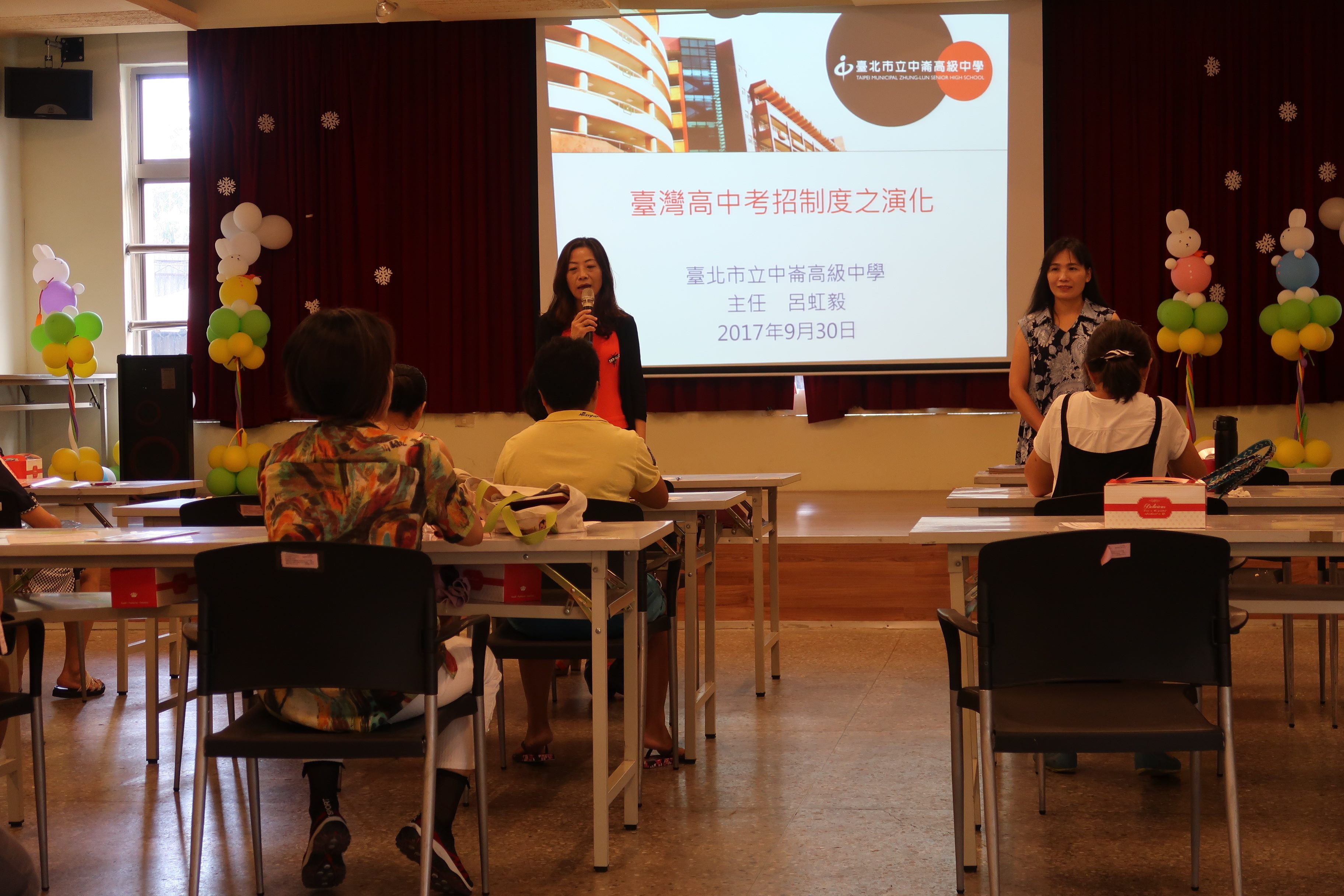 Taipei Department of Education explaining the focus of the meeting.