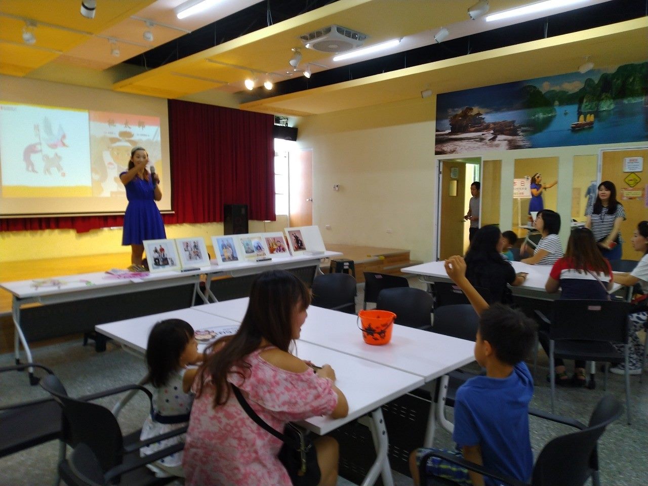 Teacher sharing the story of Momotarō