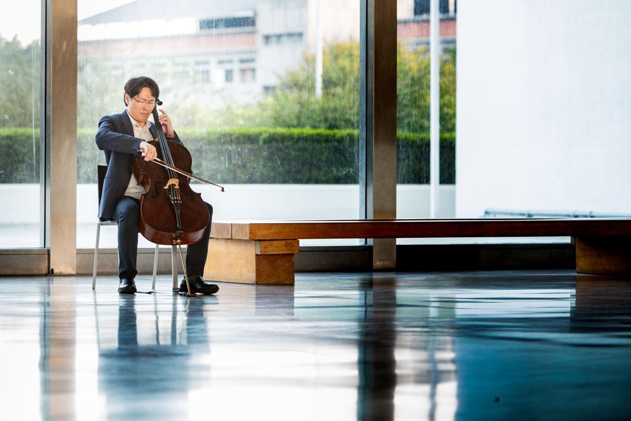 Taiwanese-American cellist Kenneth Kuo rehearses at Taipei Fine Arts Museum.