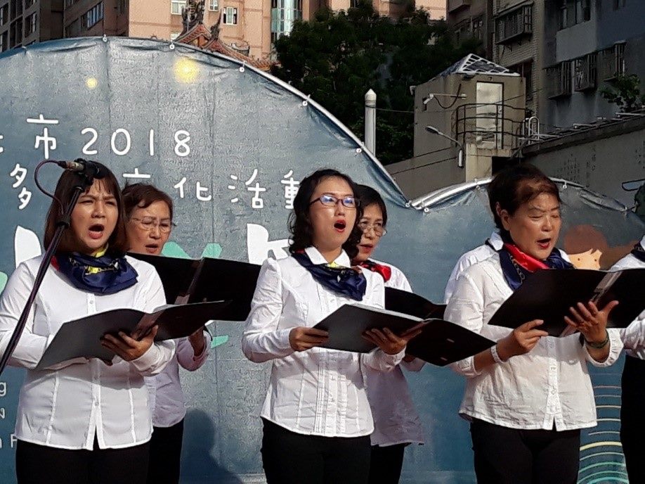 Xinyi Vocal Class group seriously perform their best at the event