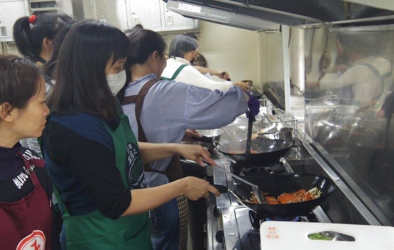 Students learning how to cook