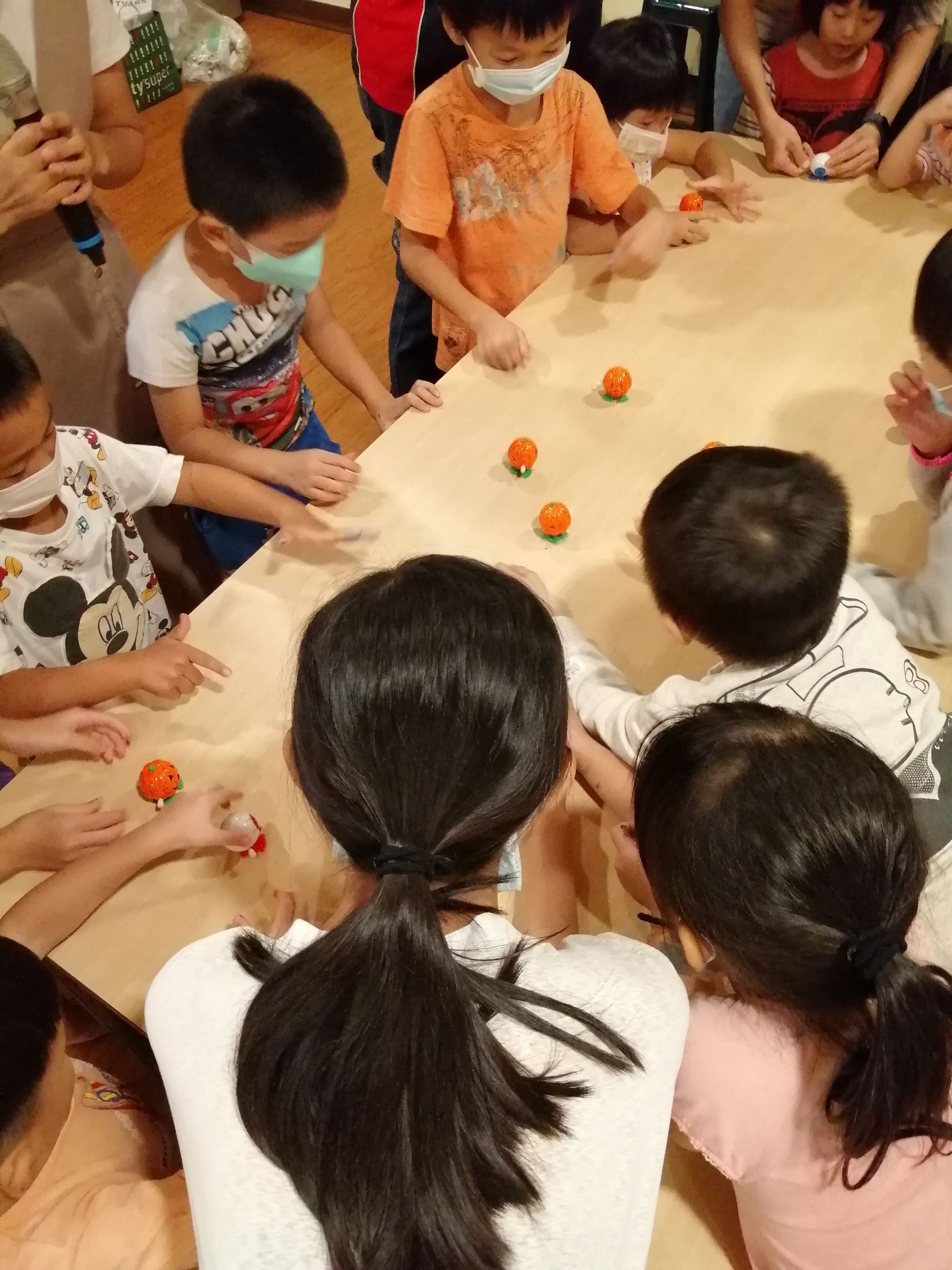 Children sharing their Halloween toys