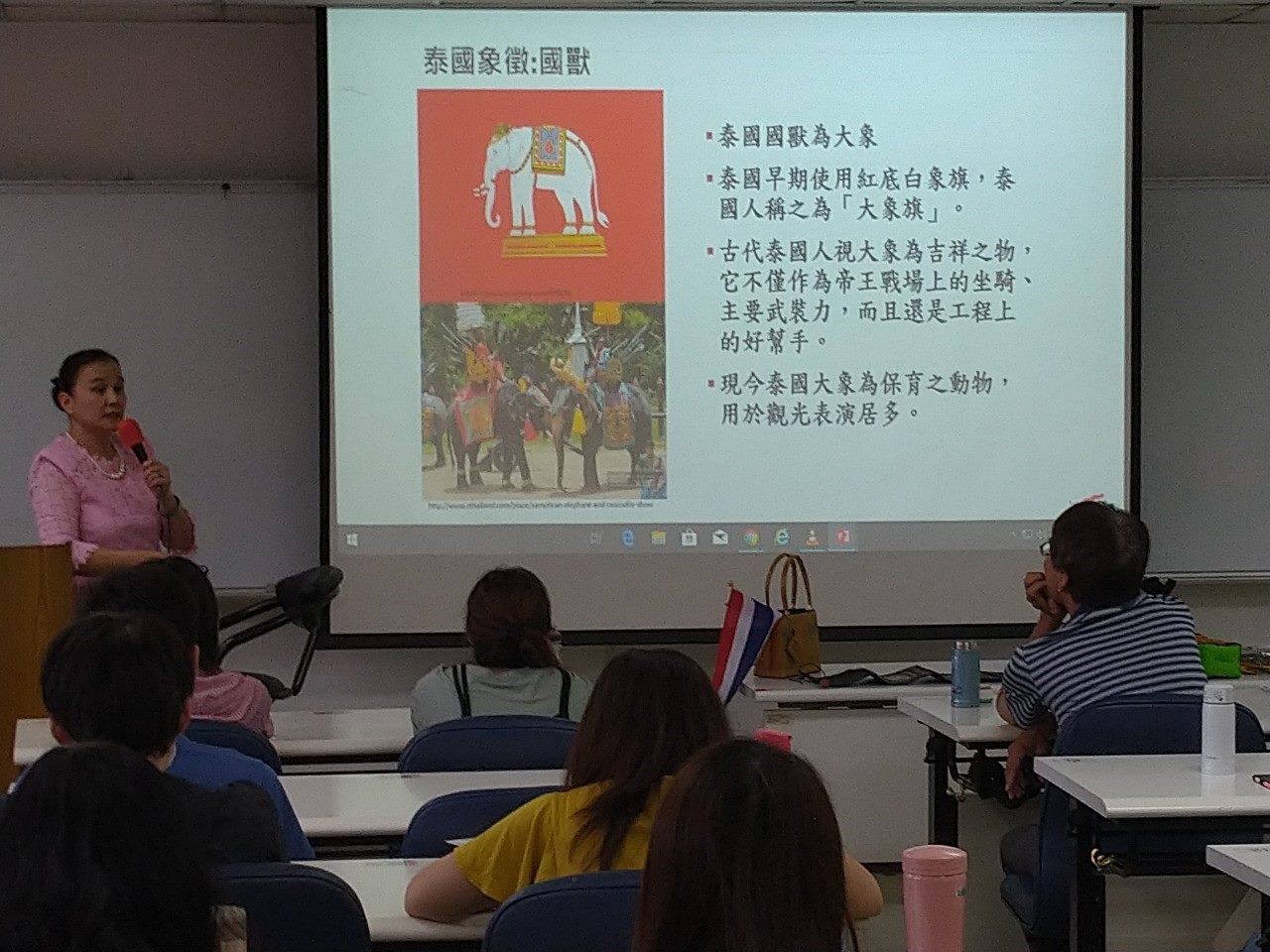 Thai lecturer introducing Thai elephants