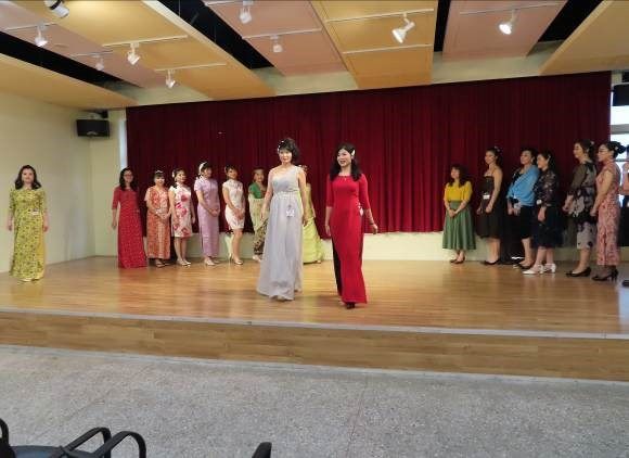 Students showing their designs on catwalk