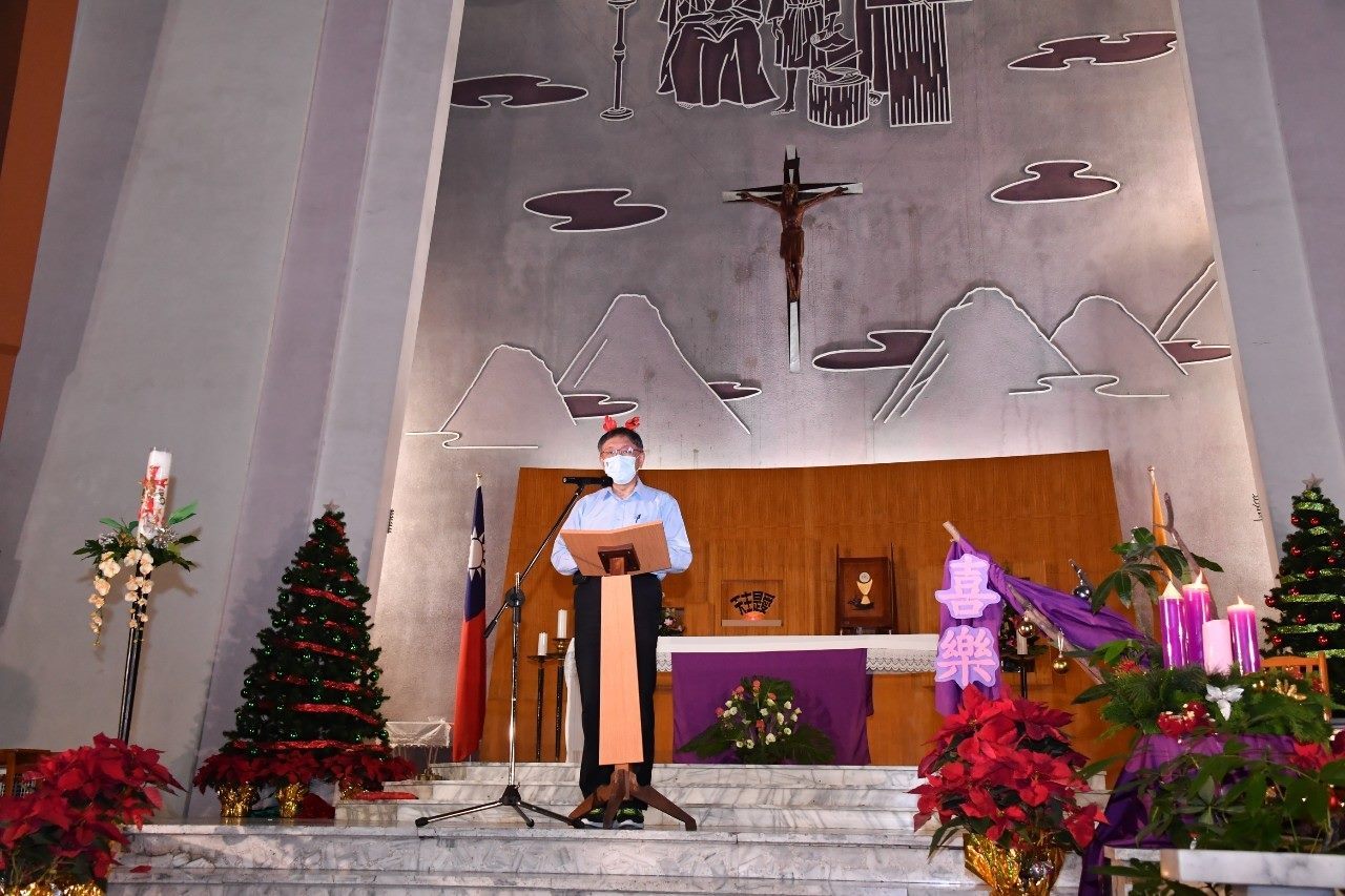 Mayor delivering his speech at a church