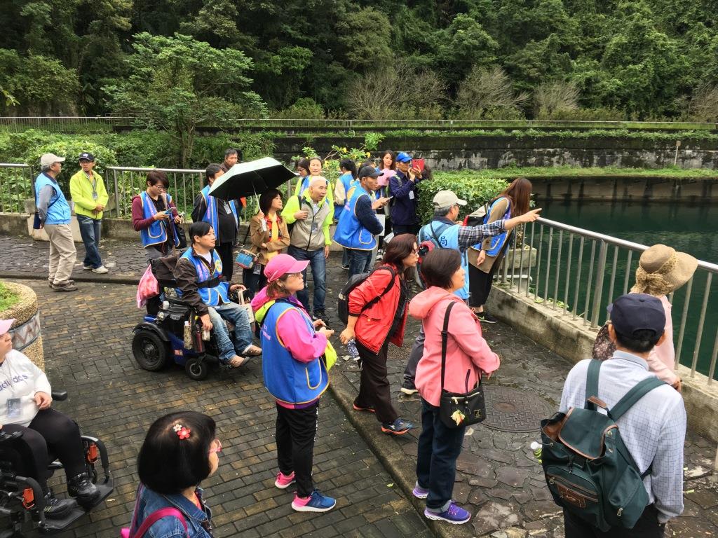 Tourists visit the Taipei Feitsui Reservoir Dam